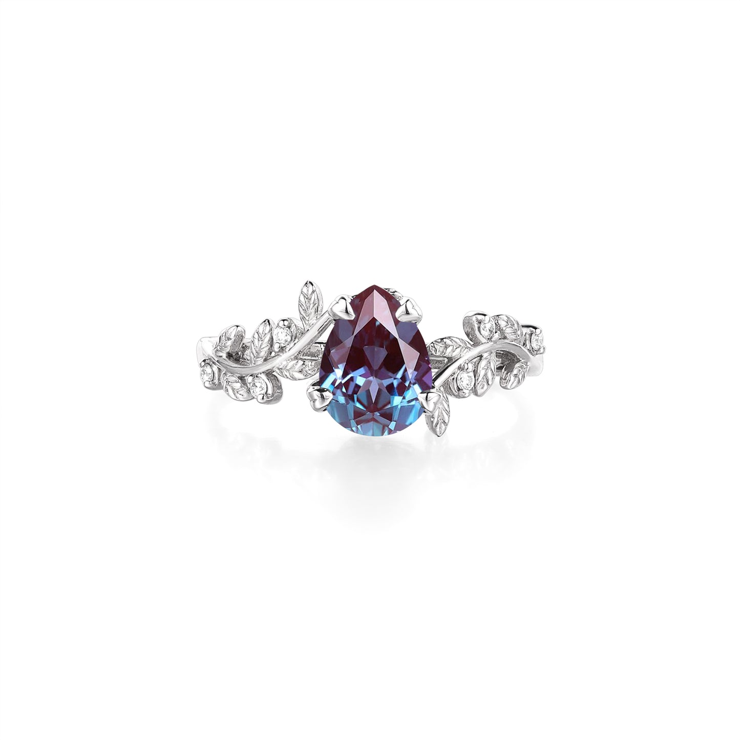 Pear-shaped alexandrite ring with detailed leaf design and diamond embellishments.