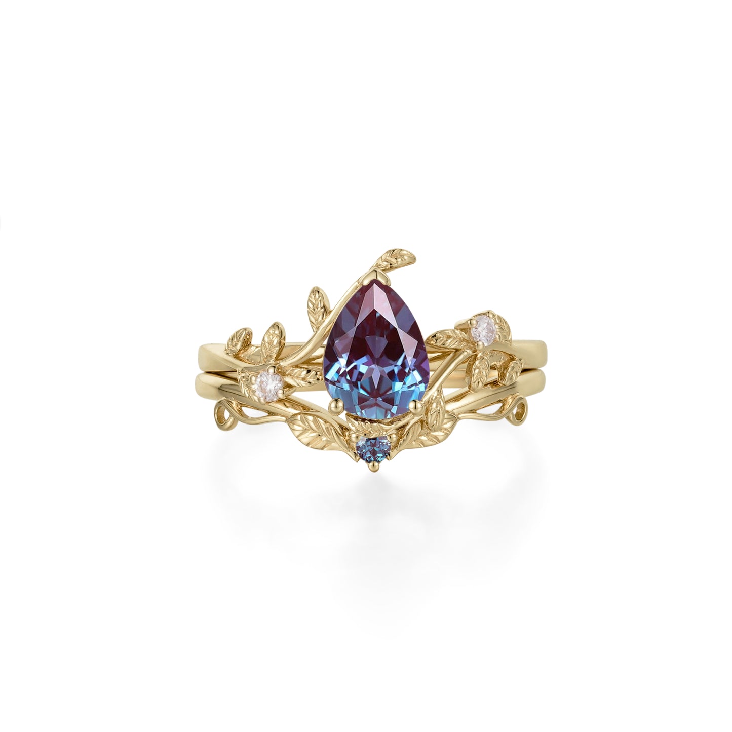 Nature-inspired engagement ring set with pear lab alexandrite and floral moissanite details.