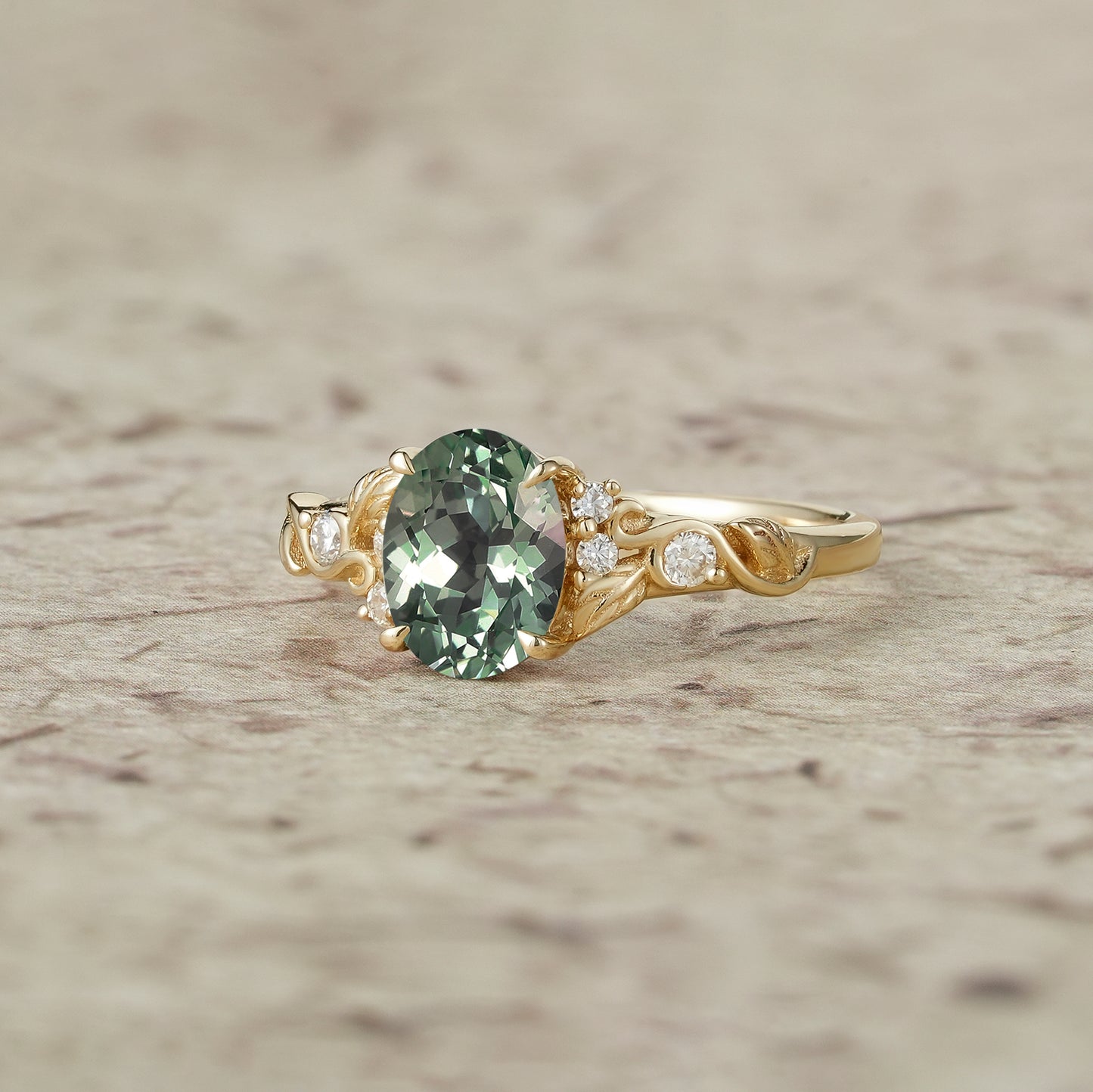 Nature's Embrace: Oval Cut Green Sapphire Leaf Ring - Lila