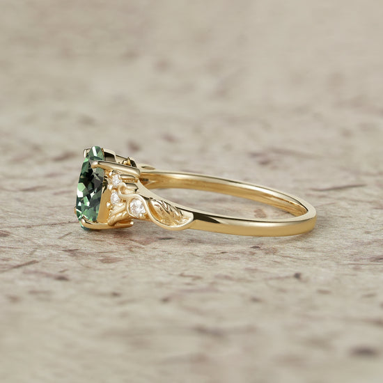 Nature's Embrace: Oval Cut Green Sapphire Leaf Ring - Lila