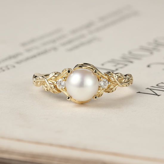 Embrace of Nature: Pearl Leaf Engagement Ring