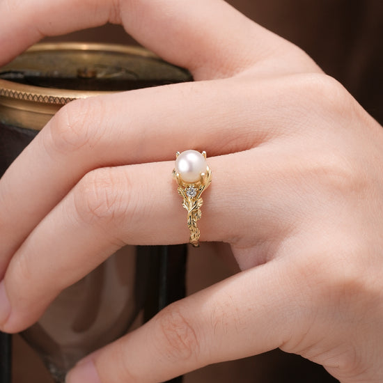 Embrace of Nature: Pearl Leaf Engagement Ring