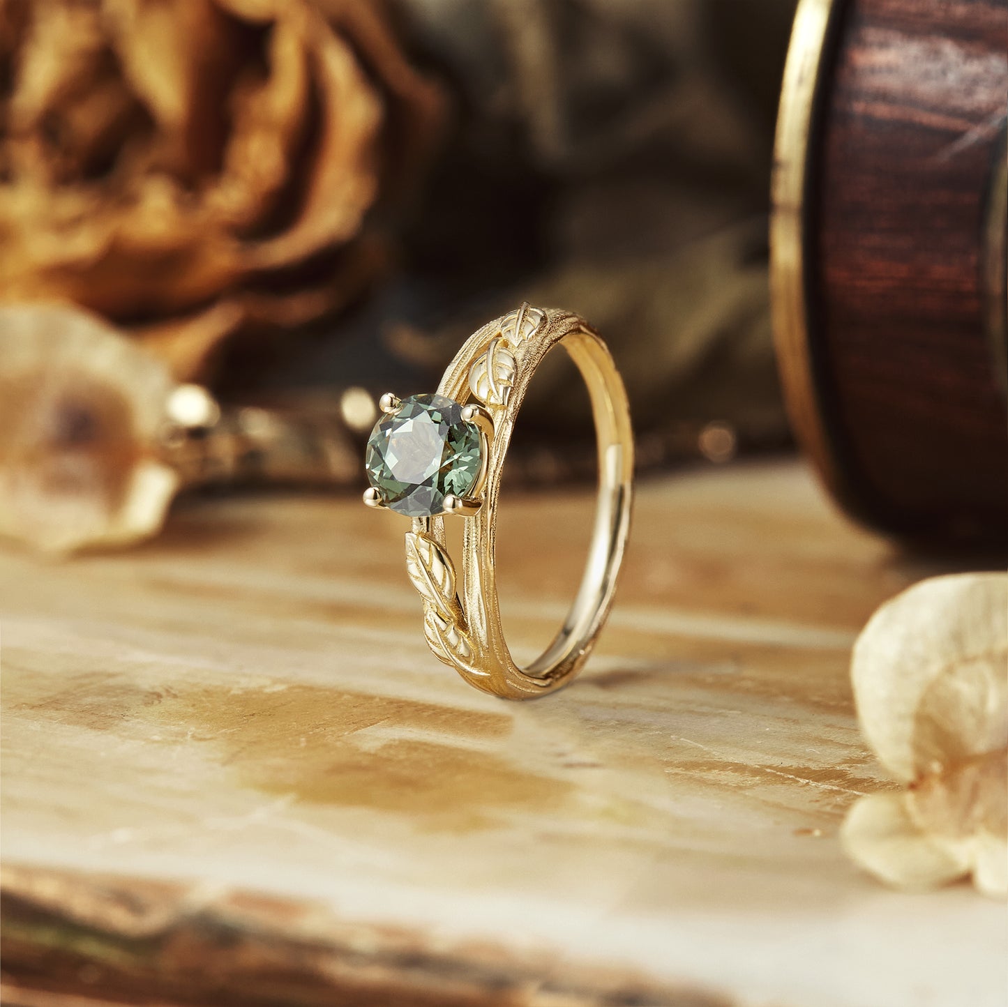 Nature-inspired twig ring featuring round lab-grown green sapphire and intricate engravings