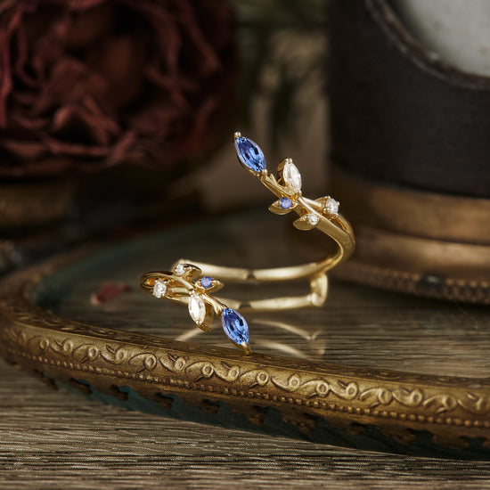 Leaf-inspired gold ring with lab-grown sapphires and diamonds