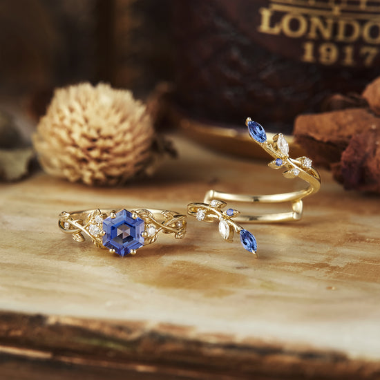 Hexagon sapphire and vine ring set featuring intricate gold design and moissanite details