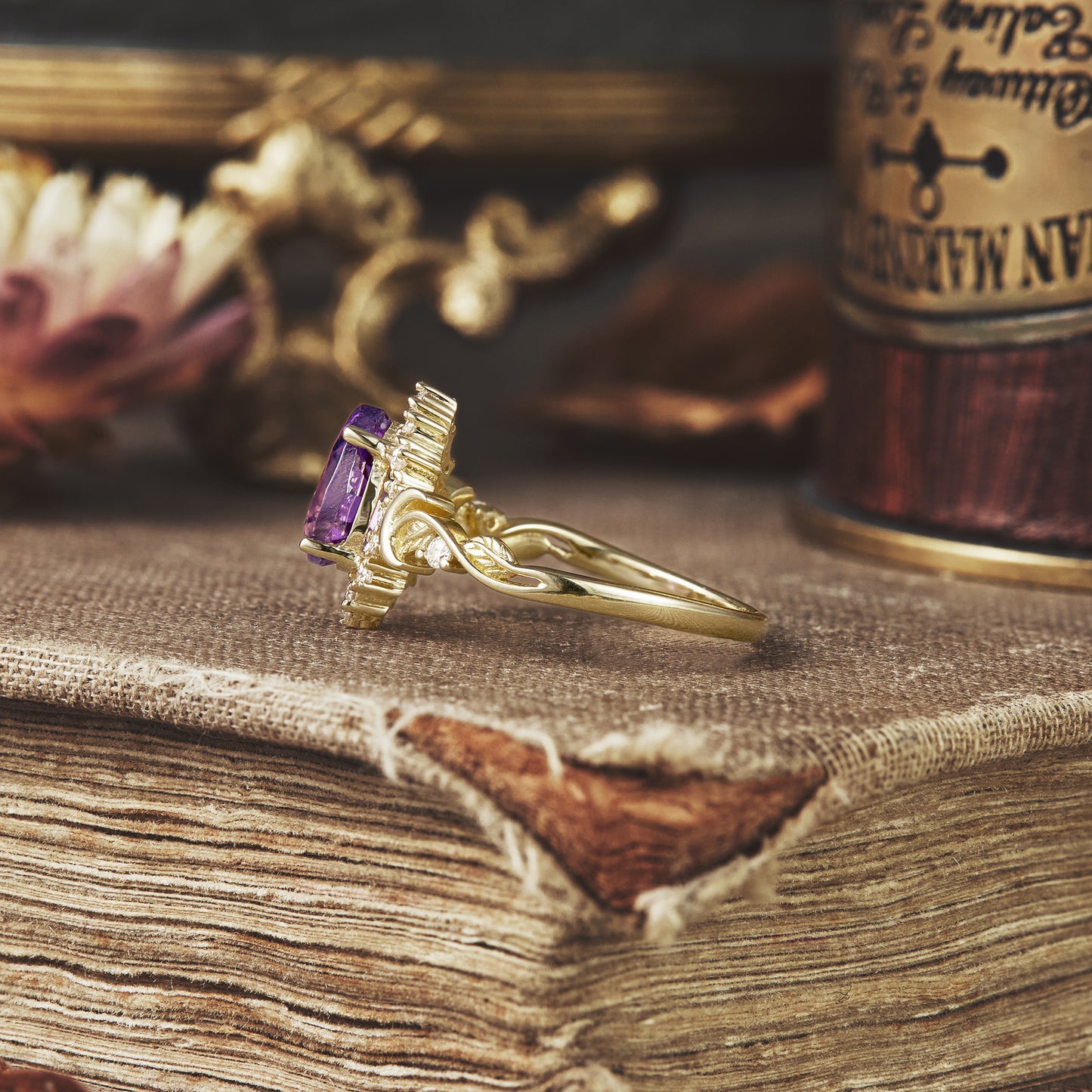 Side view of Luna purple sapphire ring with nature-inspired leaf design.