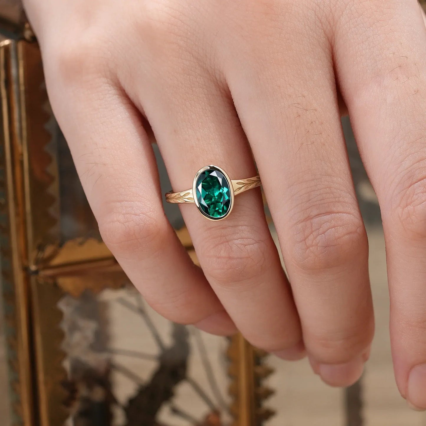 Golden Elegance: Oval Emerald Leaf Ring | Celia - GemsMagic
